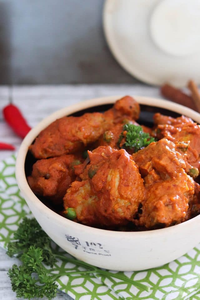 A classic Malaysian dish of chicken in spicy tomato sauce