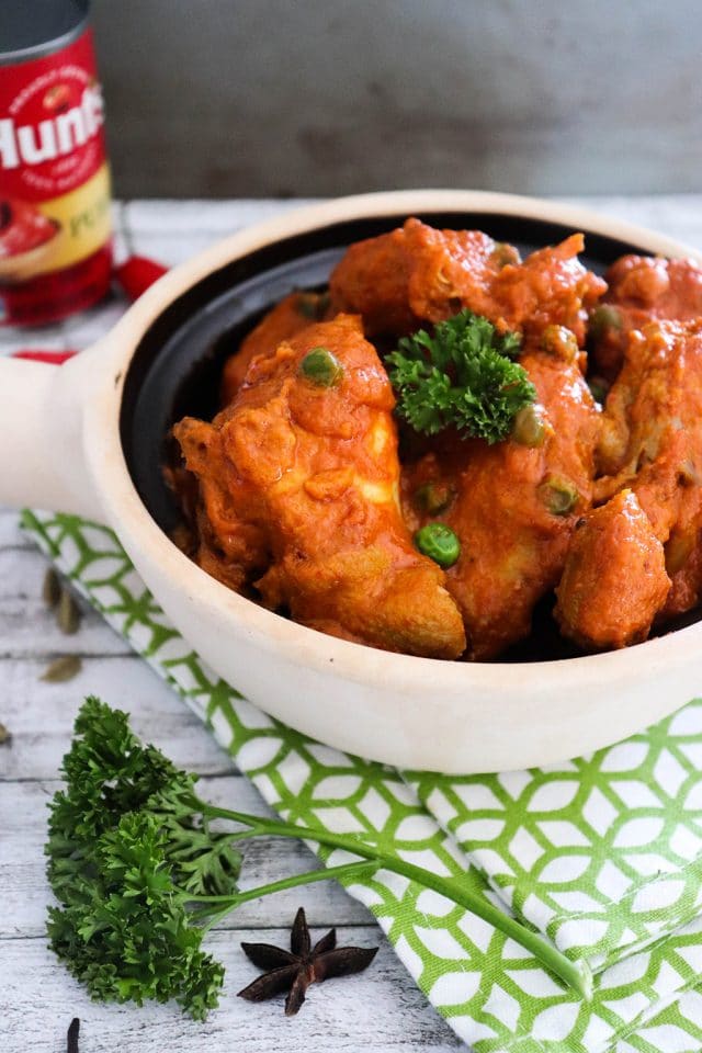 A classic Malaysian dish of chicken in spicy tomato sauce