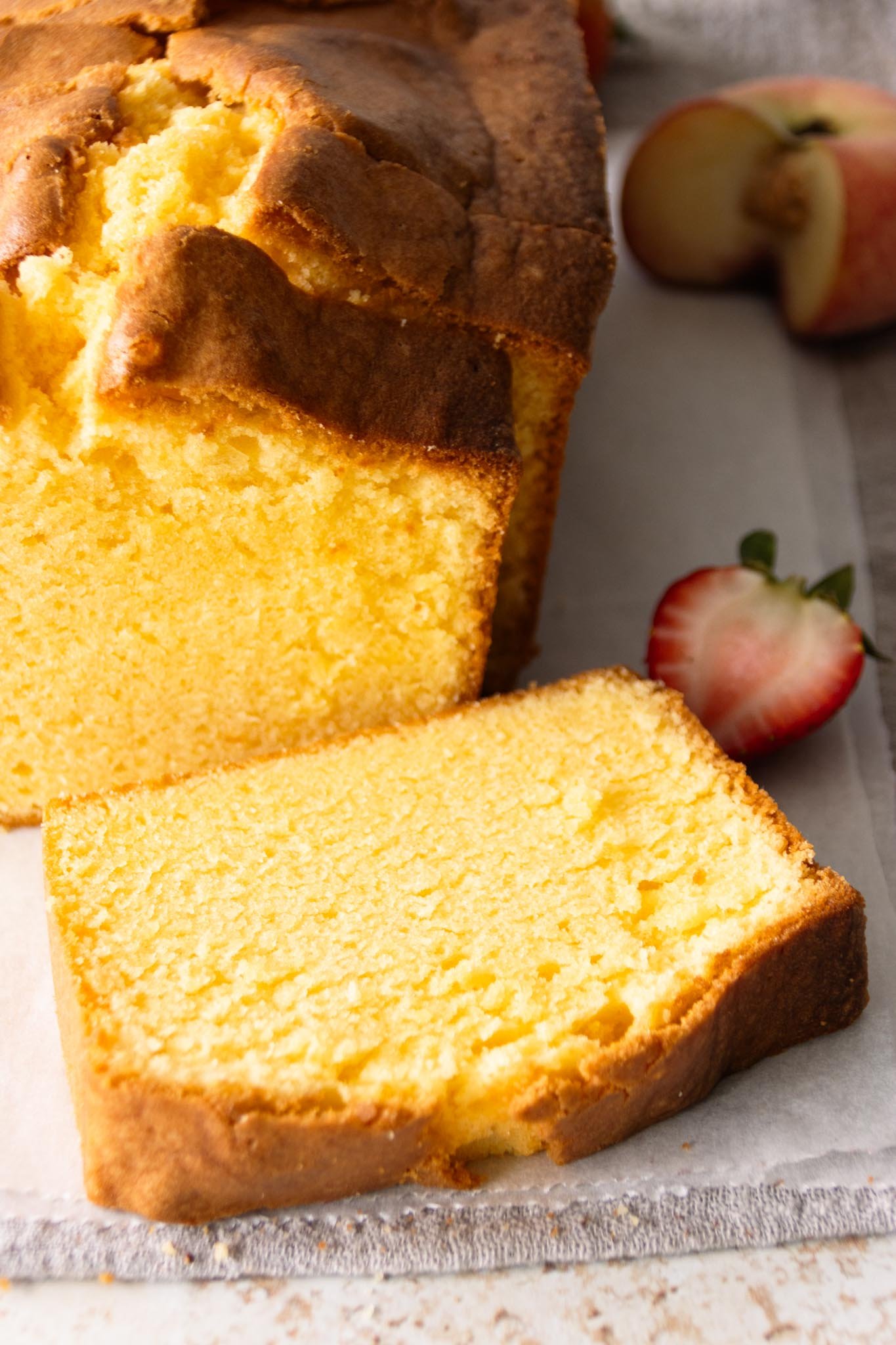 Close-up view of pound cake slices, showing the moist, buttery, and velvety smooth crumb.